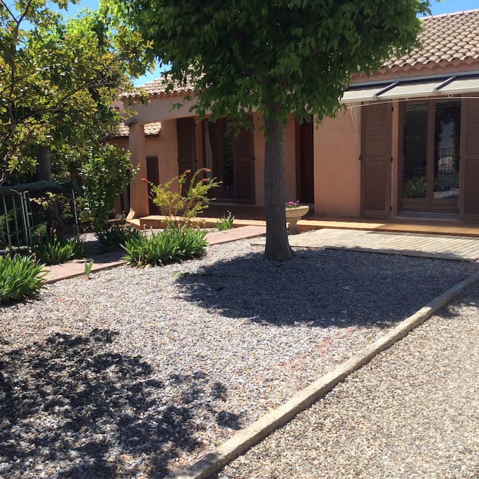 This shows the front of the house where you can sit outside the kitchen