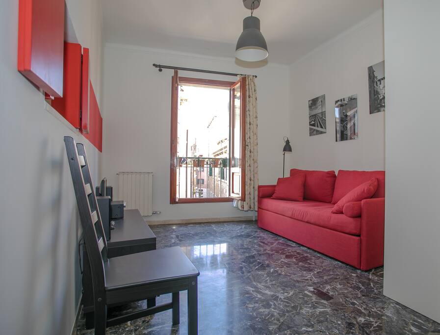 A bright living room with sofa-bed!