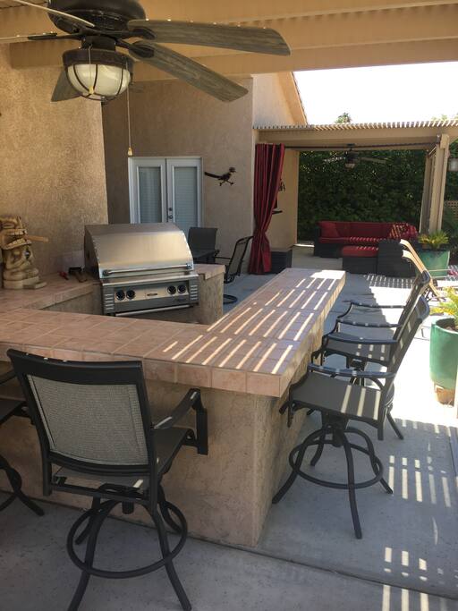 BBQ island with fan and shade to escape the heat and cook your lunch.