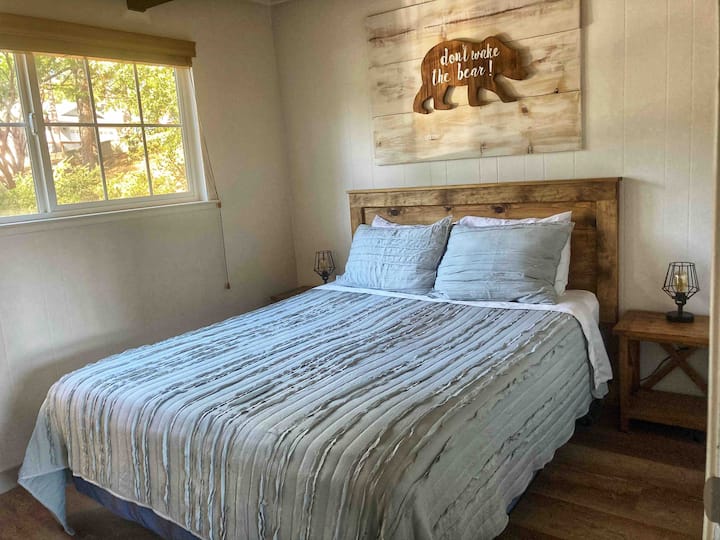 The Bear Cave bedroom is near the kitchen and next to the Floundering Fish Room.  This room has a DVD player (adult and kid DVDs provided).