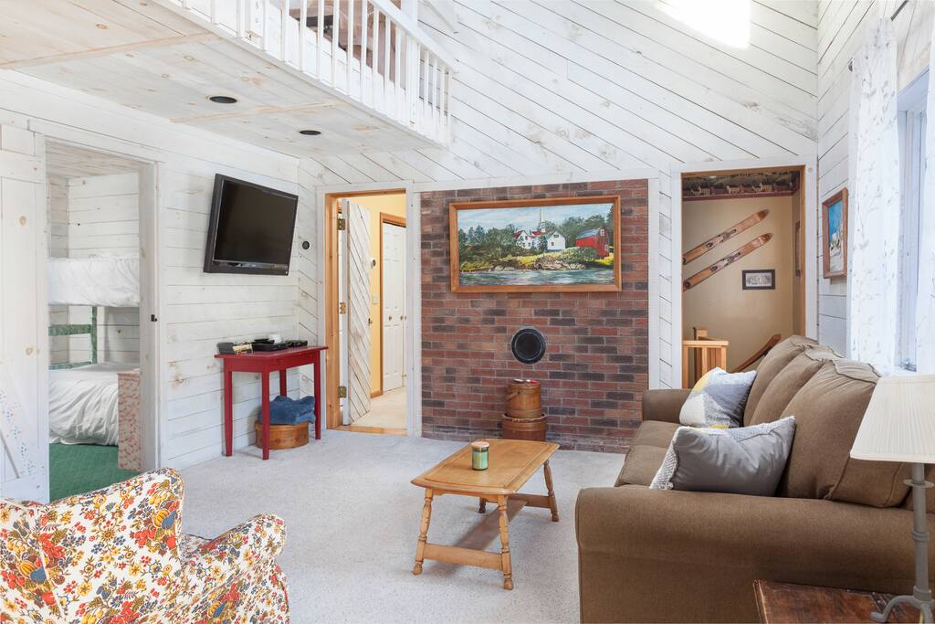 Relax on the comfortable queen sized pullout couch in the living room and pop on some Netflix using the Amazon Fire Stick enabled television.