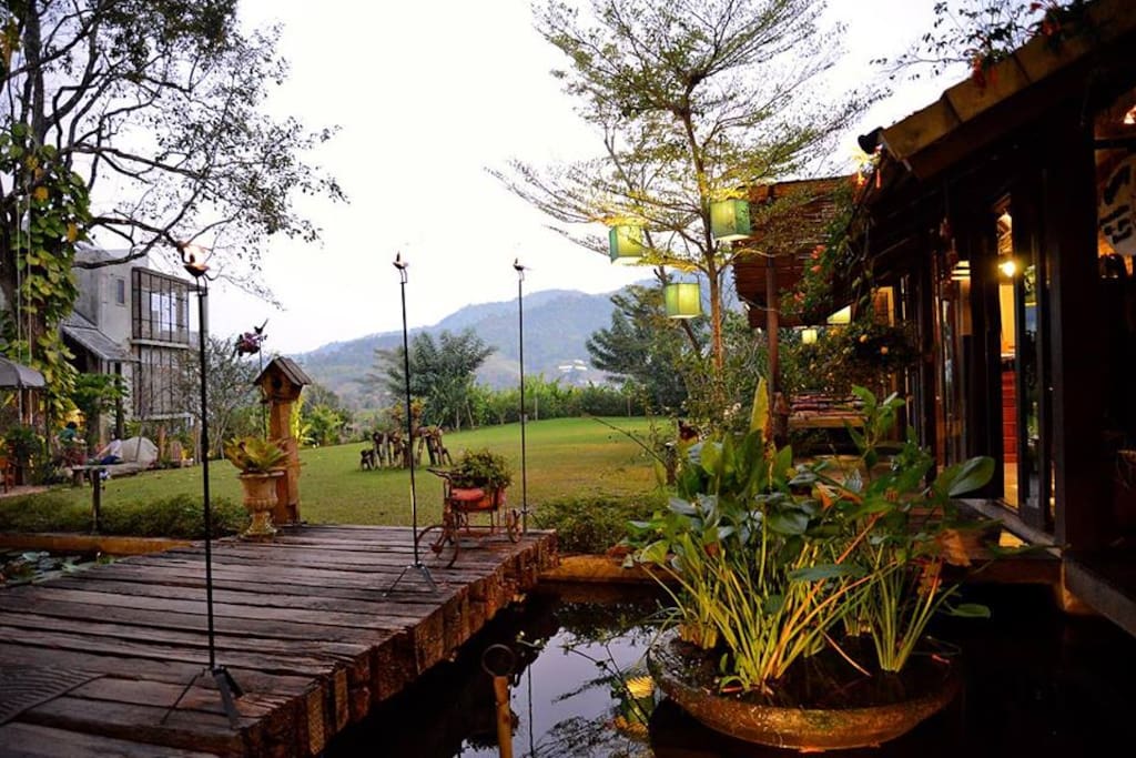 A few steps walk from your villa to see mountain view from our spacious yard.