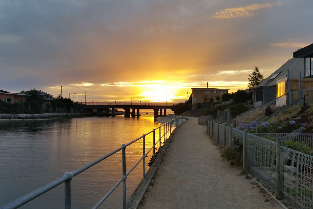 Sunet on rhe river track, that is at the front of our home. The river track goes to the beach without having to cross a road.