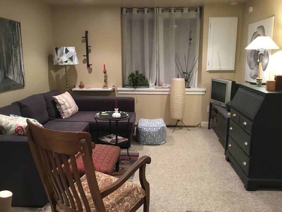 Living area with comfy pull-out chaise sofa; new Roku flat screen HDTV (not pictured), printer