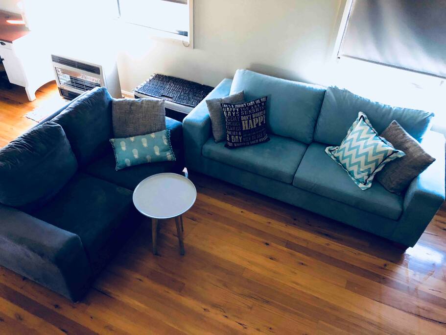Comfy lounge room with tv and DVD player as well as a sofa bed for extra guests