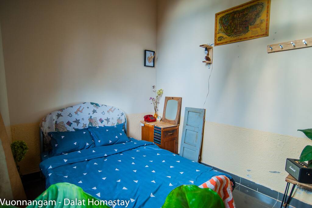 Sunset single private room with simple decor and furniture.
