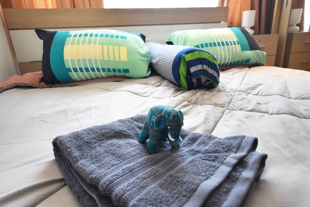 Bed & Guardian Elephant of Towels