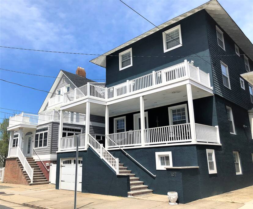 Two decks and I also own the gray home next door if you need more room!