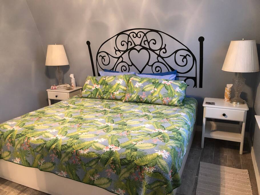 Bedroom - king bed, dresser, armoire, and access to back deck