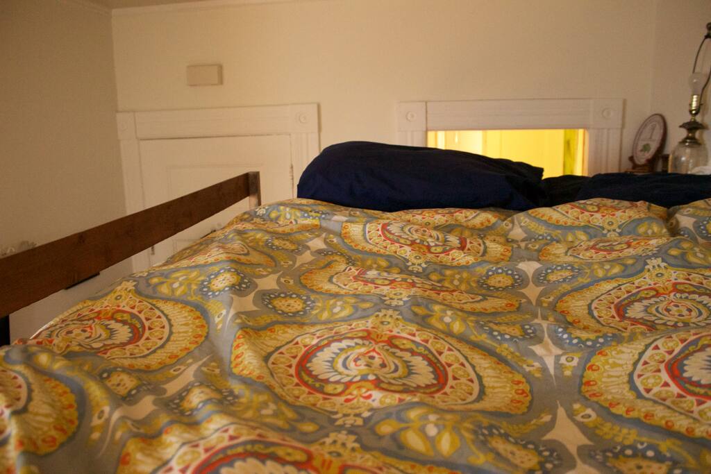 A lofted bed with plenty of space up top.