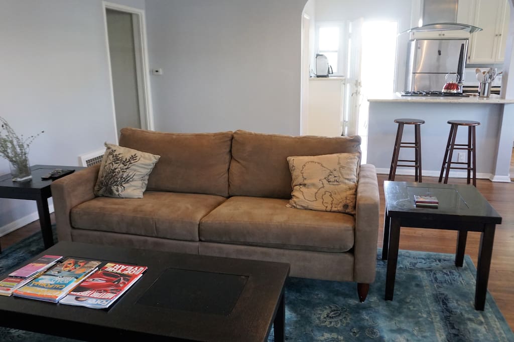 Relax in the comfortable couch while watching TV or reading one of books in the house