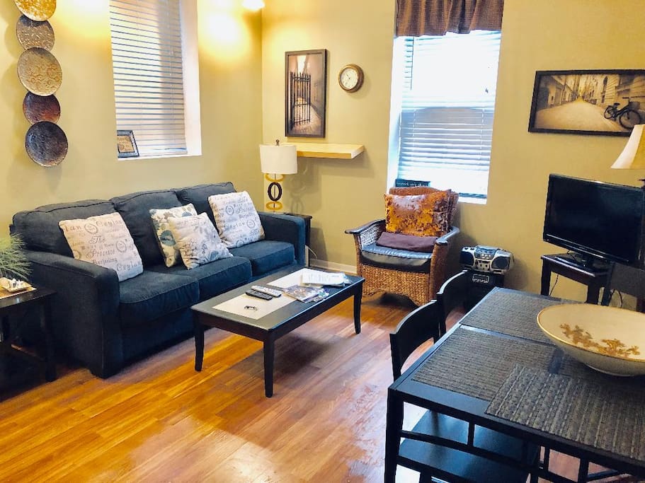 Living and dining area. New queen size sleeper sofa. Dining table that seats 4