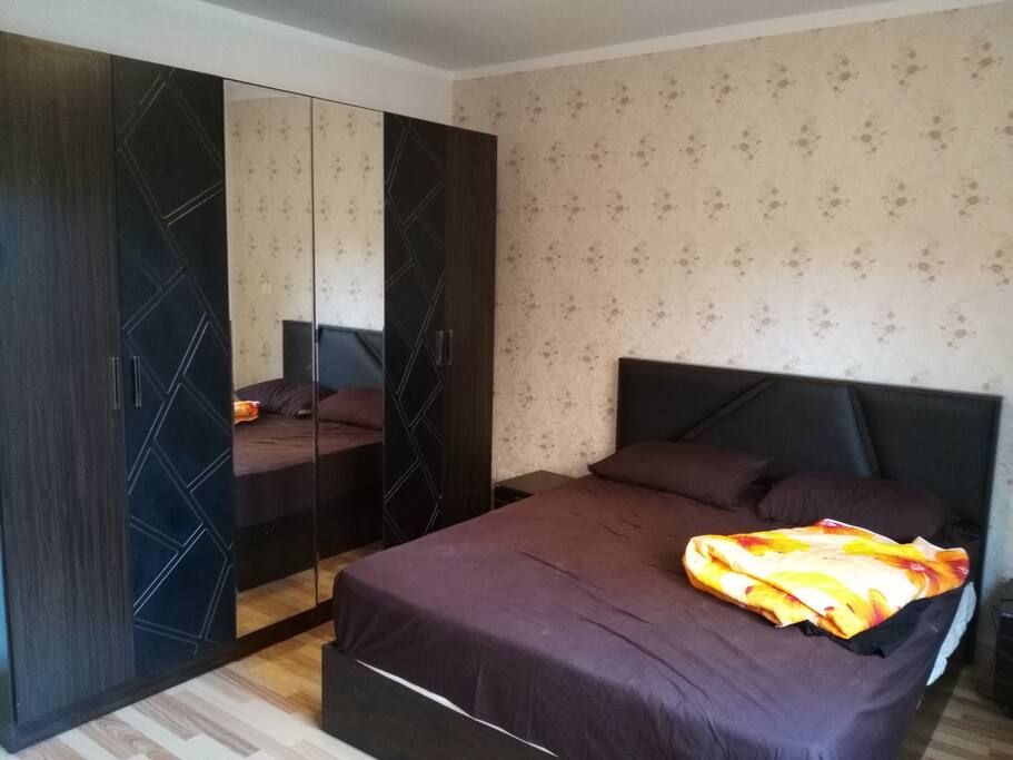 Main Bedroom; double bed, closet space and chest of drawers. Full length and wide mirrors. Modern air conditioning. Window out to back garden.