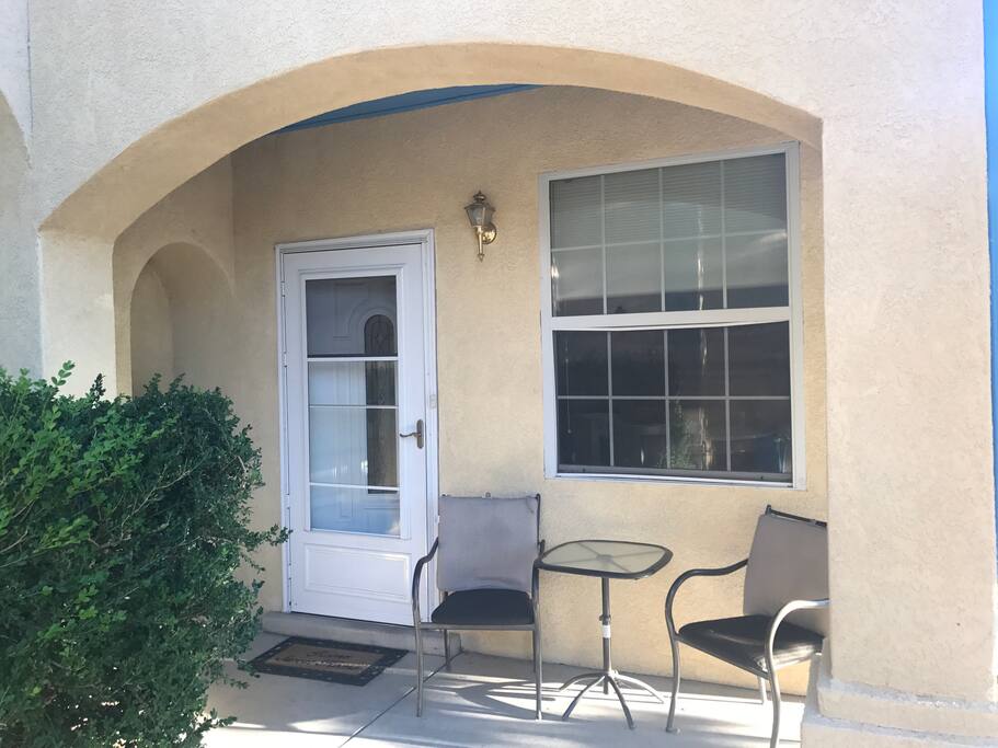 Front porch entrance with patio furniture