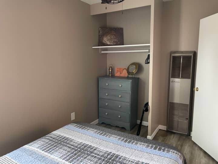 Dressers and hanging options in each bedroom.  Second and third bedrooms have plenty of shelving for storage.