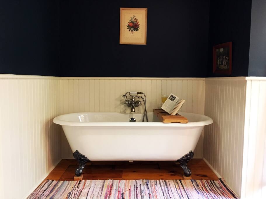 Claw foot tub and shower.