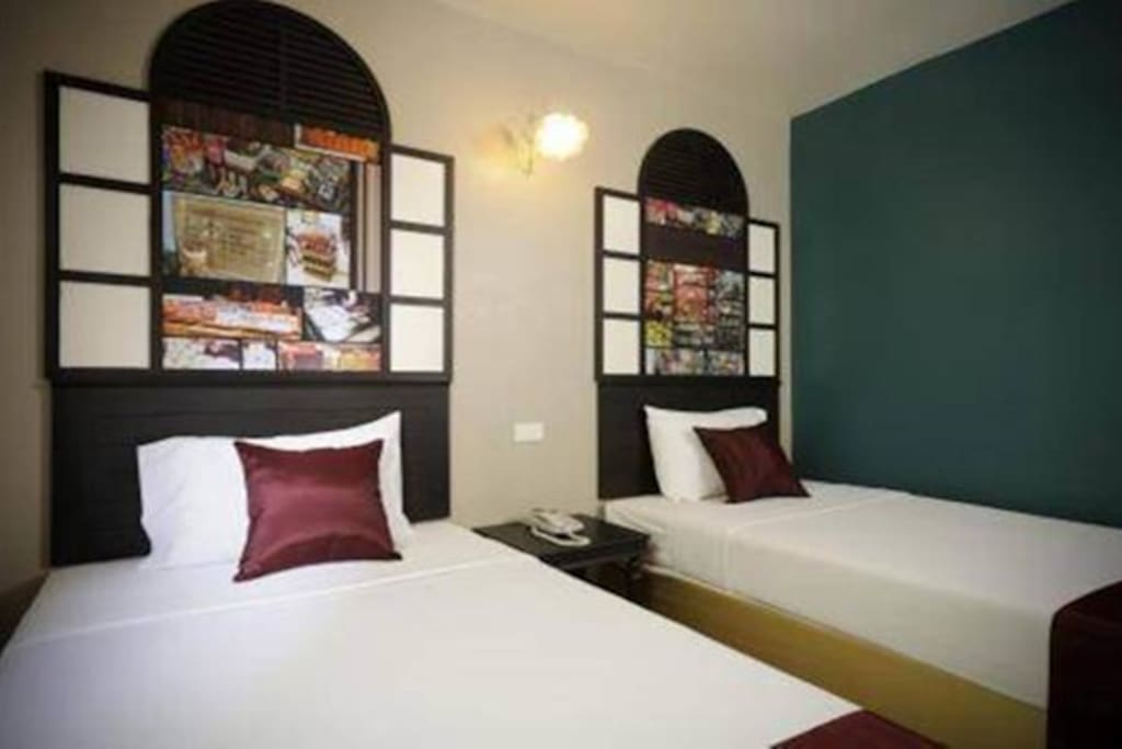 18 sq.m. room with two separate single beds with complete facility and unique decoration.Features of this room include air conditioner, free WiFi Internet, laptop-size safety box, fridge, bathroom amenities, sattelite TV, working desk, hair dryer.