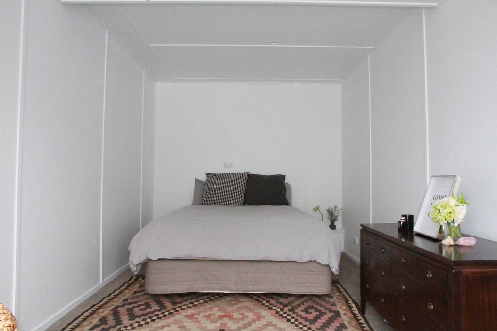 Large bedroom - with very comfortable queen size bed and draws.