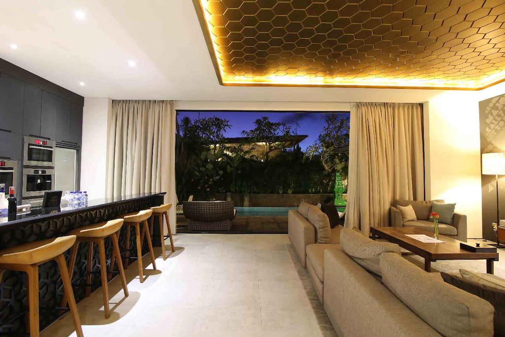 Bar and living room space, open for pool viewing