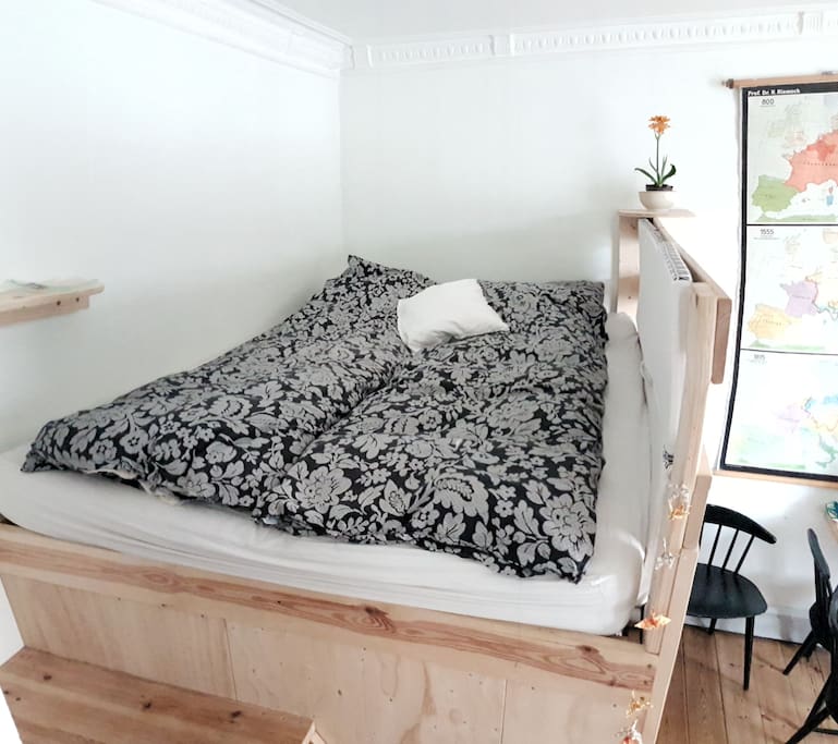 The elevated double bed.