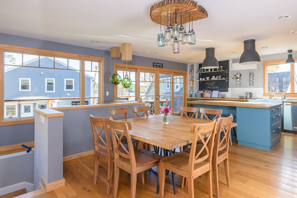 Modern, bright kitchen and dining area.