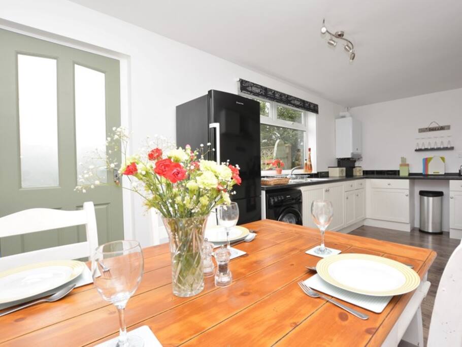 Bright dining area, sits 4 comfortably.