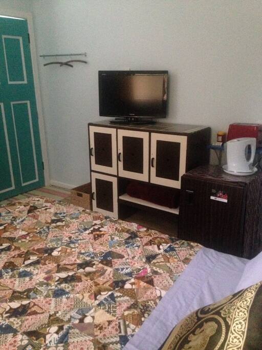 Your TV and tea coffee making facilities with bar fridge