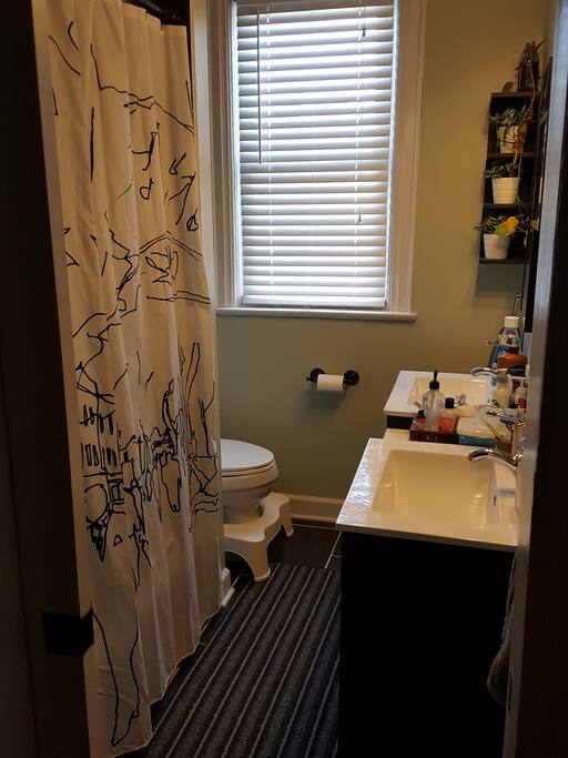 This is the shared bathroom on the same floor as your private bedroom and our family's bedrooms. You're welcome to use it!