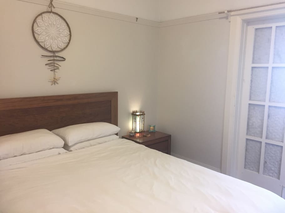 Queen size bed with sustainable organic bamboo linen