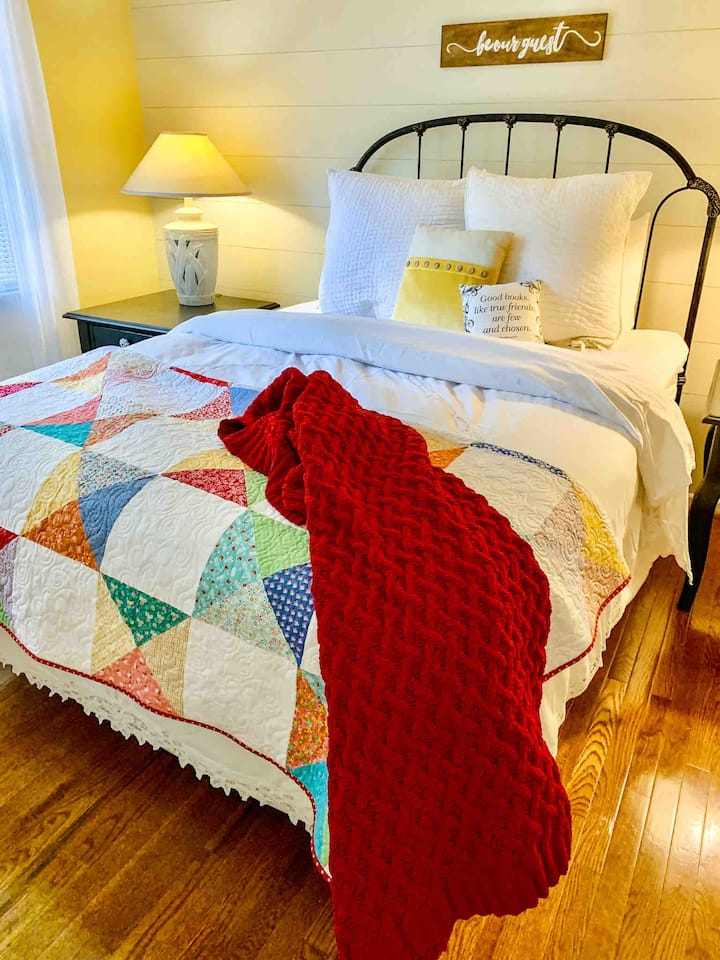 Bedroom With Queen Size Bed.  Eva made the quilt.  Mike (Eva's husband) and brother-in-law installed the shiplap. 