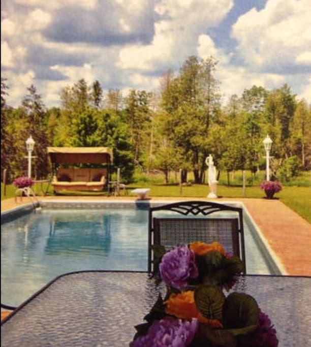 The outdoor pool awaits you with a variety of many seating areas for your comfort and steps to the Saugeen River for kayaking, fly fishing or relaxation.