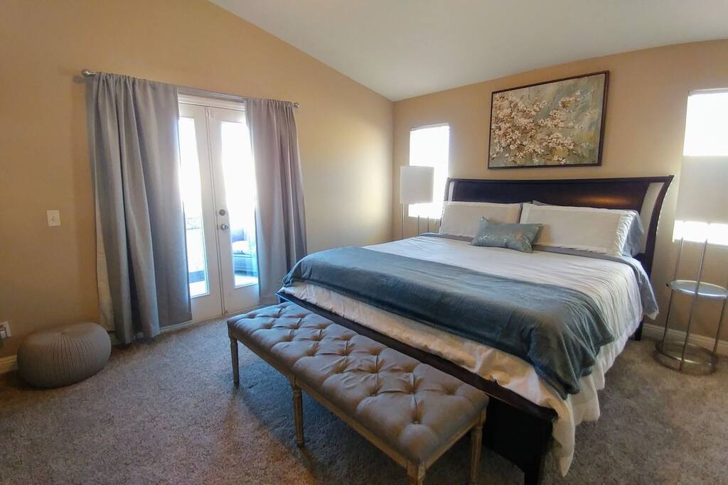 Beautiful, spacious master suite with elegant King bed. French doors open to your own furnished balcony.