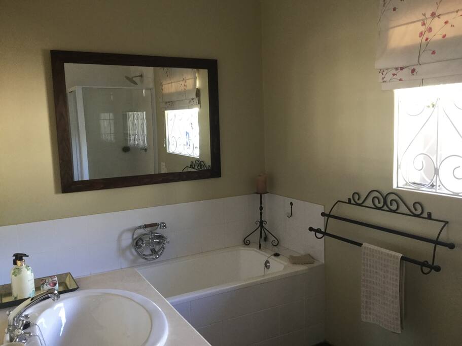 Bathroom ensuite with bath and shower
