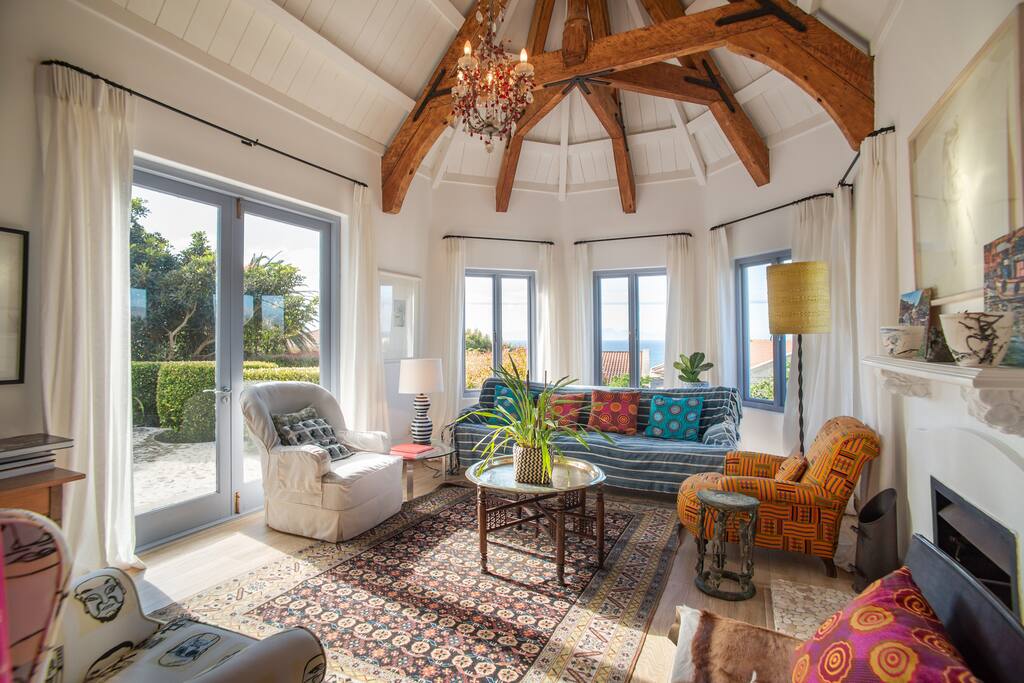 Sitting room with the original Rafters and fireplace