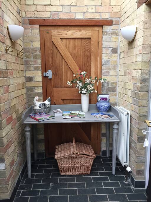 Welcome entrance- for wellies, coats and with local information