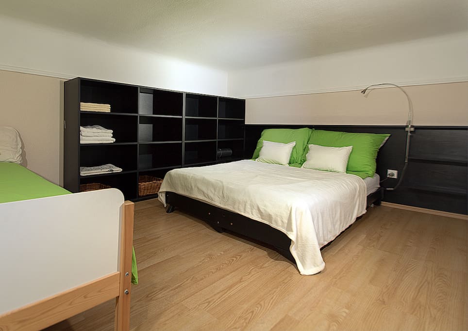 A Double bed and also a Single bed located upstairs. Also a lot of storage space is available.