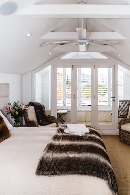 Large bedroom with city views