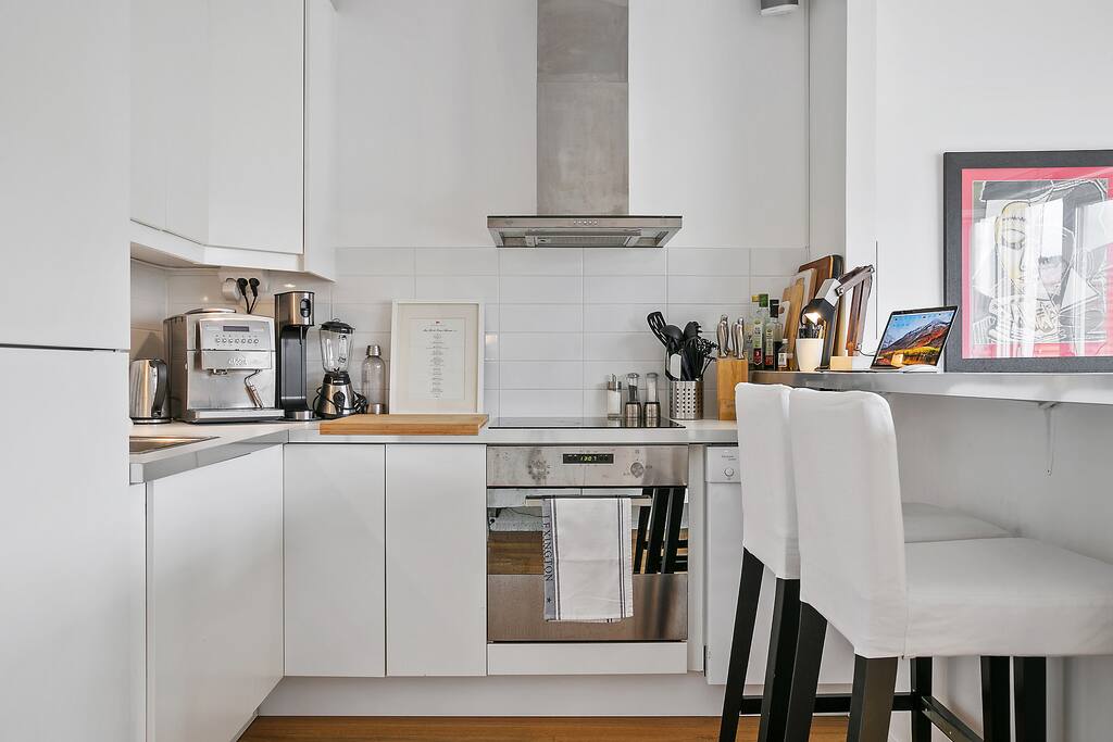 Kitchen. Equipped with fridge, freezer, stove, oven, dishwasher, coffee maker, jug kettle & and microwave.