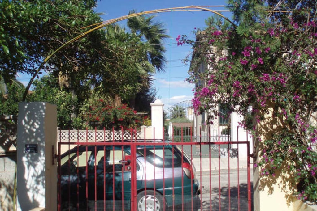 The entrance (you can park inside if you prefer), but the area is very quiet, with space for lots of cars outside (no direct neighbours down the road).
