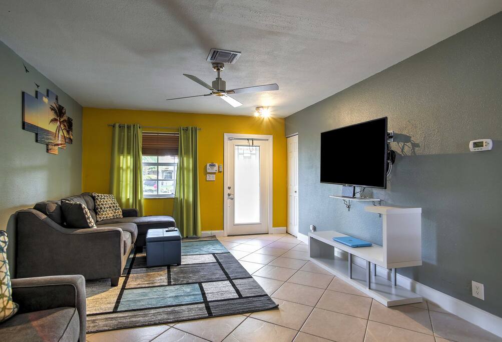 Modern decor and vibrant colors highlight the interior of the property.