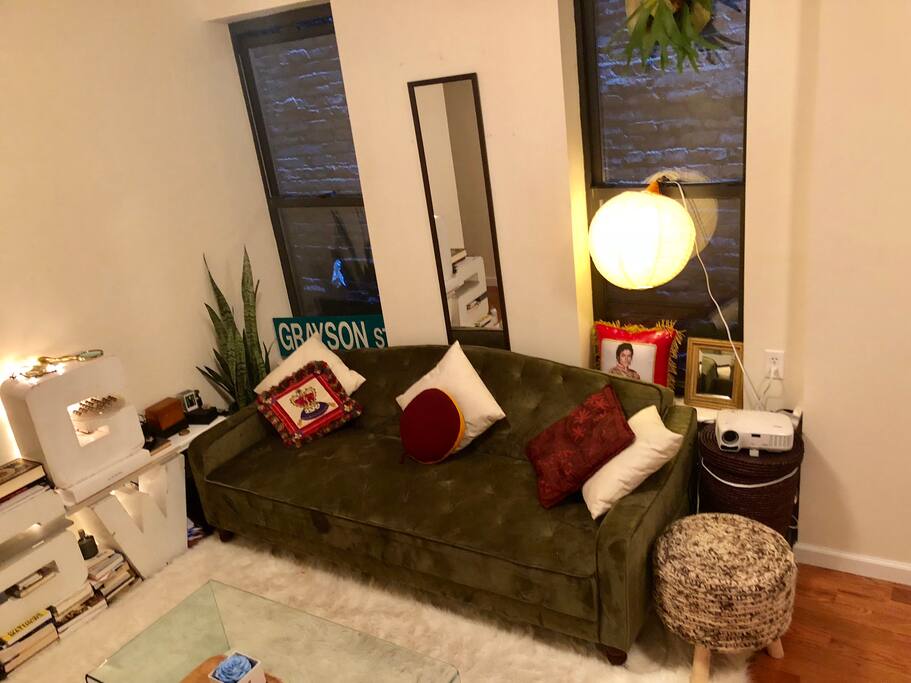 Living room, video projector connected to Amazon FireStick and Bluetooth speaker.