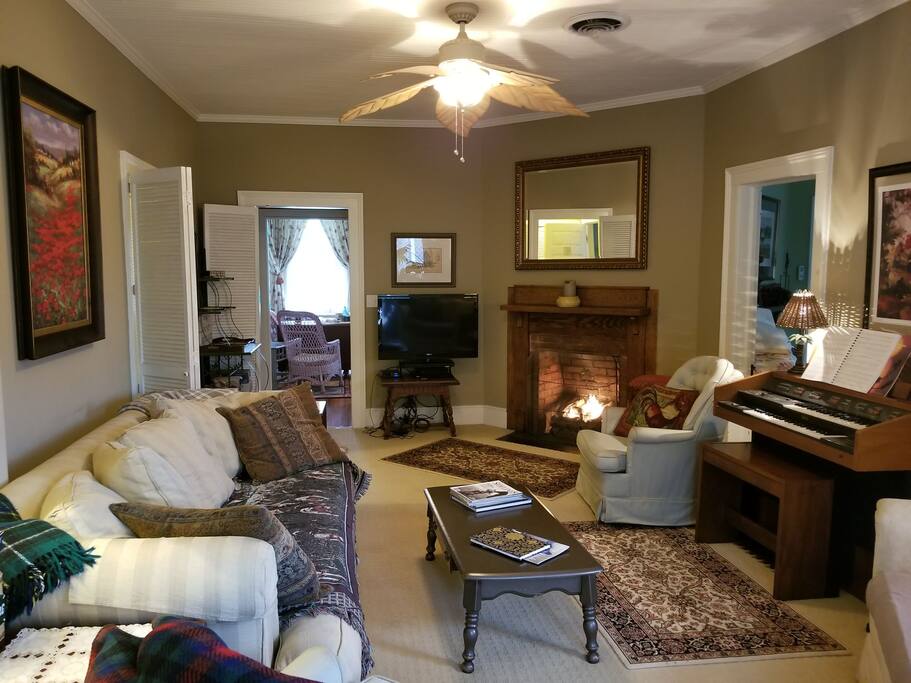 Living room looking to dining room. Bedroom on right, full handicapped bath and washer/dryer on left.