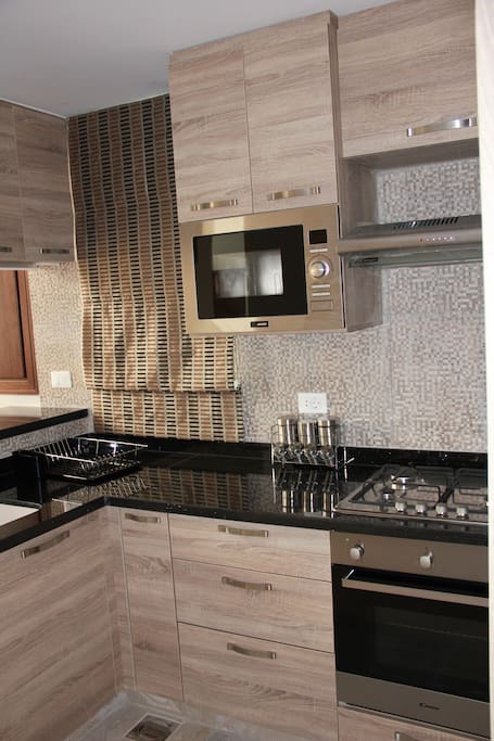 A fully equipped American style open- kitchen