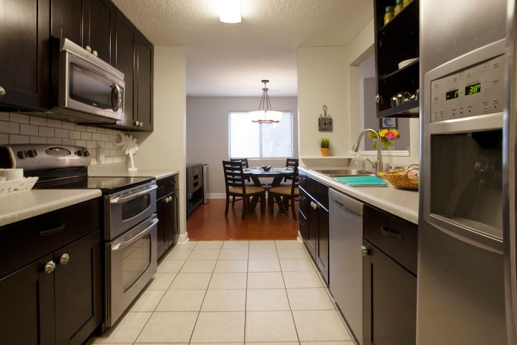 Double Oven Range With Microwave, 42" Solid Maple Cabinets.