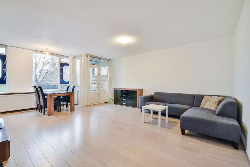 spacious living room + big couch to relax :)