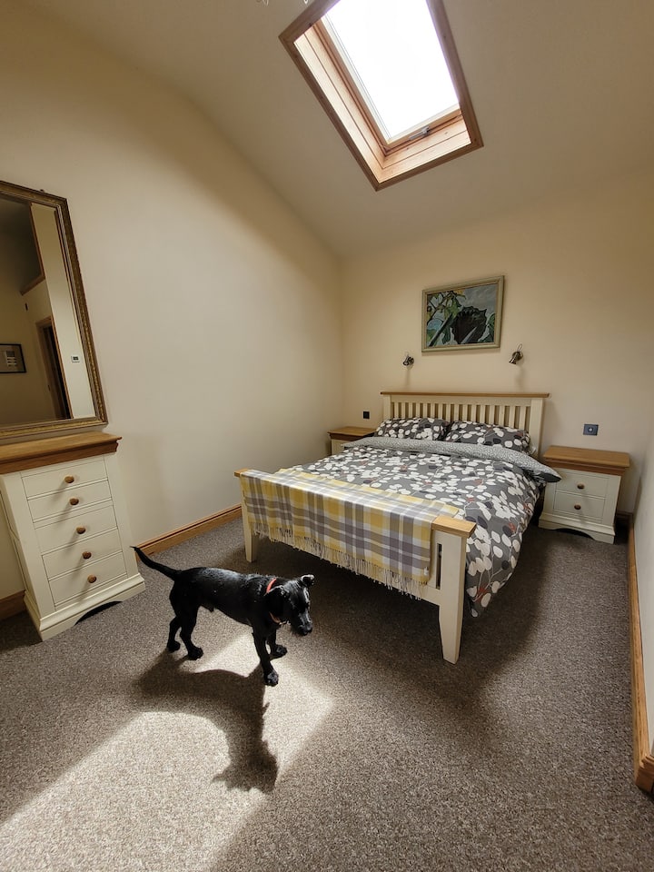 Sumptuous king sized bed with plenty wardrobe and drawer storage.