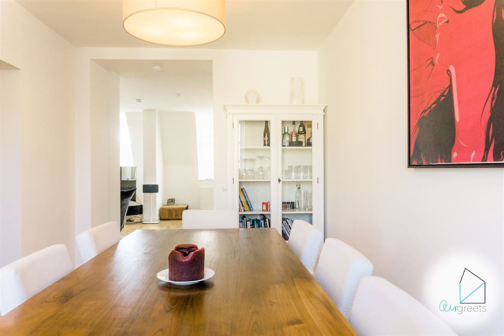 The dining room offers you a big table to enjoy your homecooked meal.