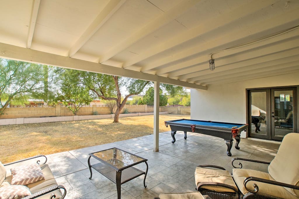 Outside you'll find a wonderful patio space, hot tub, pool table and fire pit!