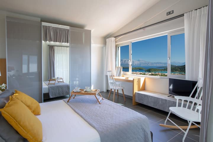 Master bedroom. Relax in a king size bed and enjoy the sea view 