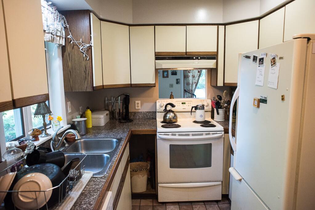 Full sized refrigerator! Plenty of pots and pans for you to use! Corkscrew and can-opener! Dishwasher!